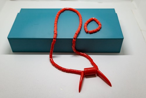 Red african cultural bead with - african,