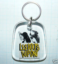 2518/ PORTE-CLÉS LES DOCKS DUPONT STYLE INCLUSION PLASTIQUE - DDP PUBLICITAIRE 