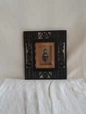 Cadre en bois marron avec masque africain 24 x 28 cm