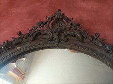 Important miroir oval mural et bois et stucs de style Louis XV - XIXe siècle