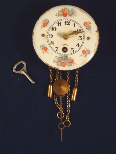 Ancien jouet pendule miniature