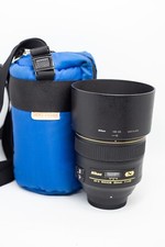 Objectif NIKON AF-S NIKKOR 85mm f/1,4 + PARE-SOLEIL HB-55/Filtre UV Hoya/HOUSSE