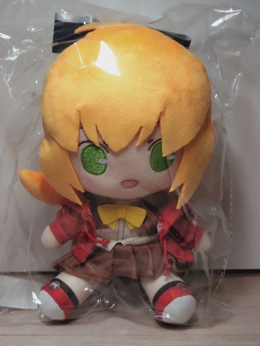 Poupée peluche assise