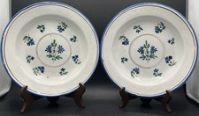 Paire d’assiettes creuses en