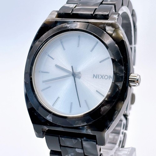 montre nixon time teller