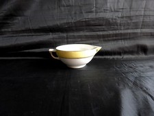 saucière blanche et jaune à