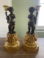 Ancienne paire de bougeoirs en