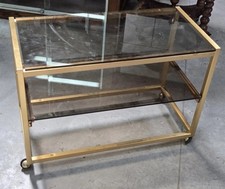 D'aprés Pierre Vandel desserte charriot a roulettes en métal doré vers 1970