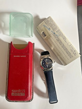 Montre SWATCH  Irony Genuine Leather.