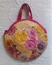 Sac à main rond à un motif floral