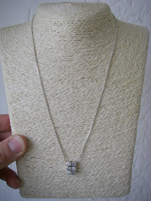 collier pendentif serti 5gr