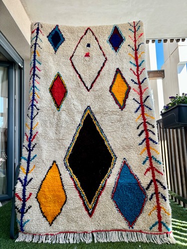 main tisse tapis
