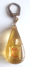 Ancien porte cle inclusion bouteille verre parfum vallée des fleurs bel état