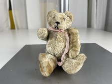 Ancien ours en peluche de