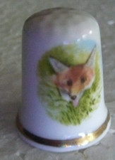 Dé à coudre de collection en porcelaine décoré d'un renard roux