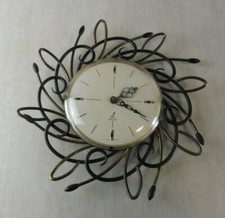 Ancienne horloge décor fer et