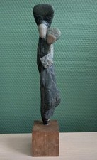 Sculpture art brut pierre bois