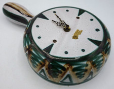 pendule poelon en céramique