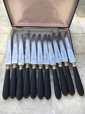 lot de 11 couteaux en ébène