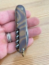 Ancien Couteau Pliant 6 fonctions Manche bois pradel ? militaire suisse ?