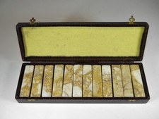 Etui de 12 porte-couteaux en