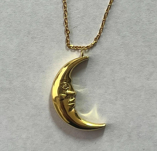 Collier pendentif visage