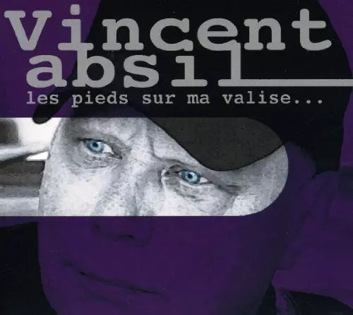 Les pieds sur valise - les,