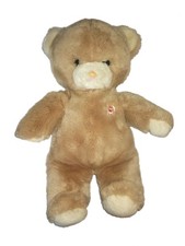 Magnifique Peluche ours beige