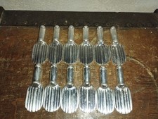 Christofle 12 porte-couteaux en métal argenté Raquette par Luc Lanel