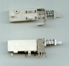 Interrupeur/poussoir