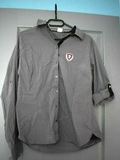 Une chemise d'équitation de couleur grise pour femme taille 44