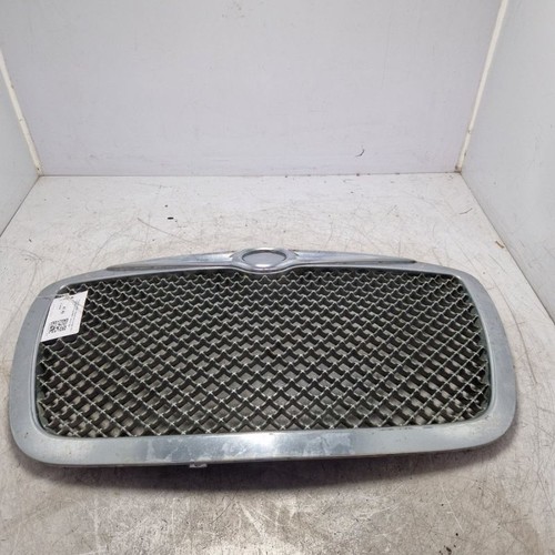 Masquerolle grille calandre
