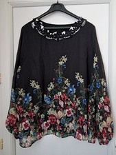 Tunique neuve taille 54-56 noire florale