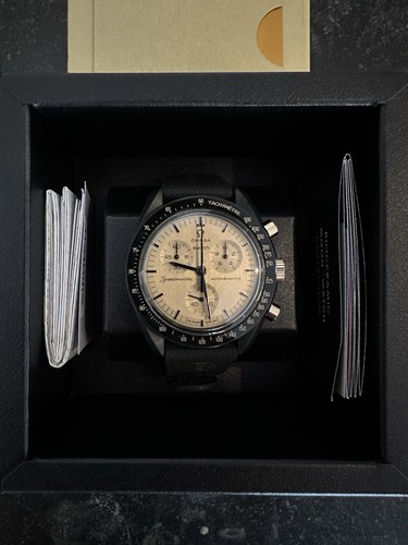 Swatch omega - swatch, x