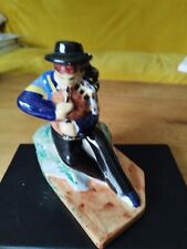 keraluc quimper.Joueur De Biniou.H14cms L14cms l9cms.Signe Georges Allier.