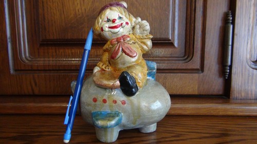 Tirelire clown avion en - et,
