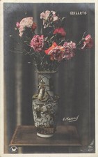 CP VASE DECORE REMPLI OEILLETS SUR SELETTE