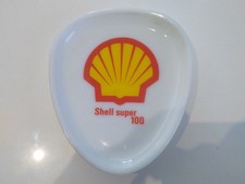 Shell. rendu de monnaie en porcelaine.