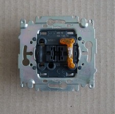 Mécanisme poussoir lumineux