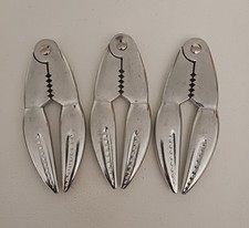 Trois Pinces À Fruits De Mer