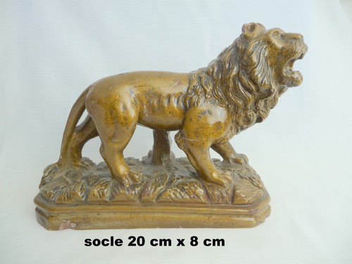 Sculpture ceramiquede lion - en,