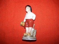 sujet paysan en porcelaine de