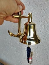 Cloche murale en laiton ,avec