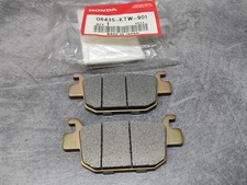 Jeu plaquettes frein arriere SH300 HONDA 06435-KTW-901