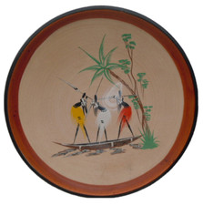 Plat motif africain pirogue