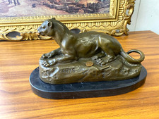 Sculpture Lion inclinée en