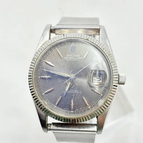 Montre ricoh medallion - montre,
