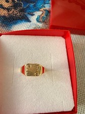 Chevalière or 750/00 avec motif facetté et strié