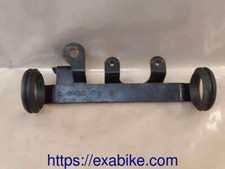 patte de phare gauche pour