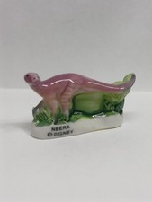 (F1) Fève feve Série Dinosaure DISNEY " NEERA "